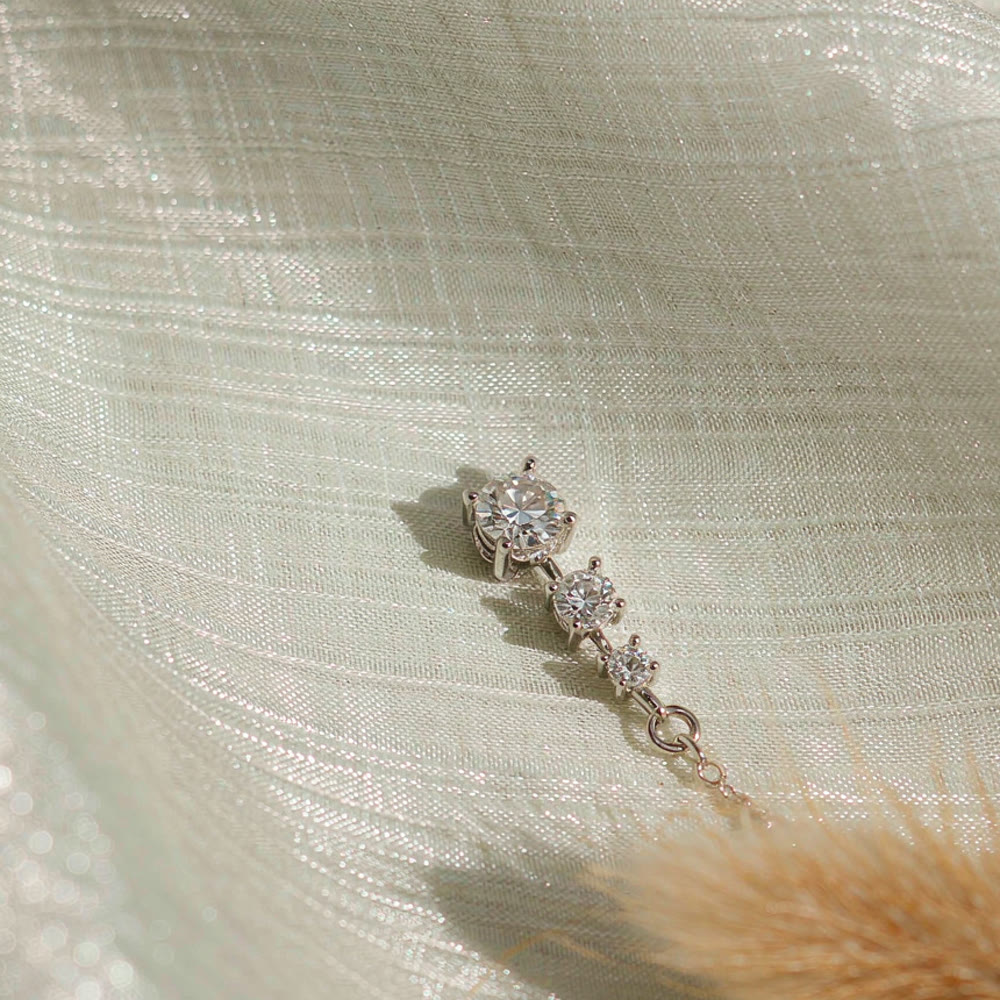 Fur Tassel Charm — Illustration of a lab-grown diamond pet memorial piece